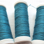 nici lniane turkusowe, turquoise linen threads.